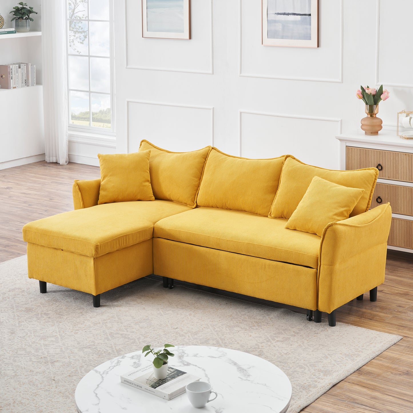 The 80-inch yellow corduroy L-shaped sofa comes with two small throw pillows that can be converted into a sofa bed for storage