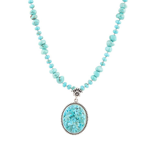 Carved Blue Turquoise and Sterling Silver Pendant
