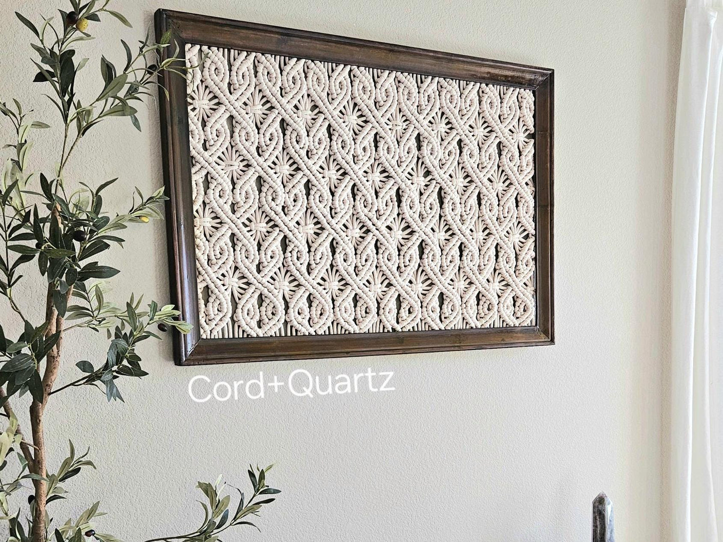 Extra large framed macrame wall hanging.